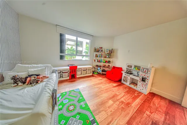 a bedroom with furniture and a bed