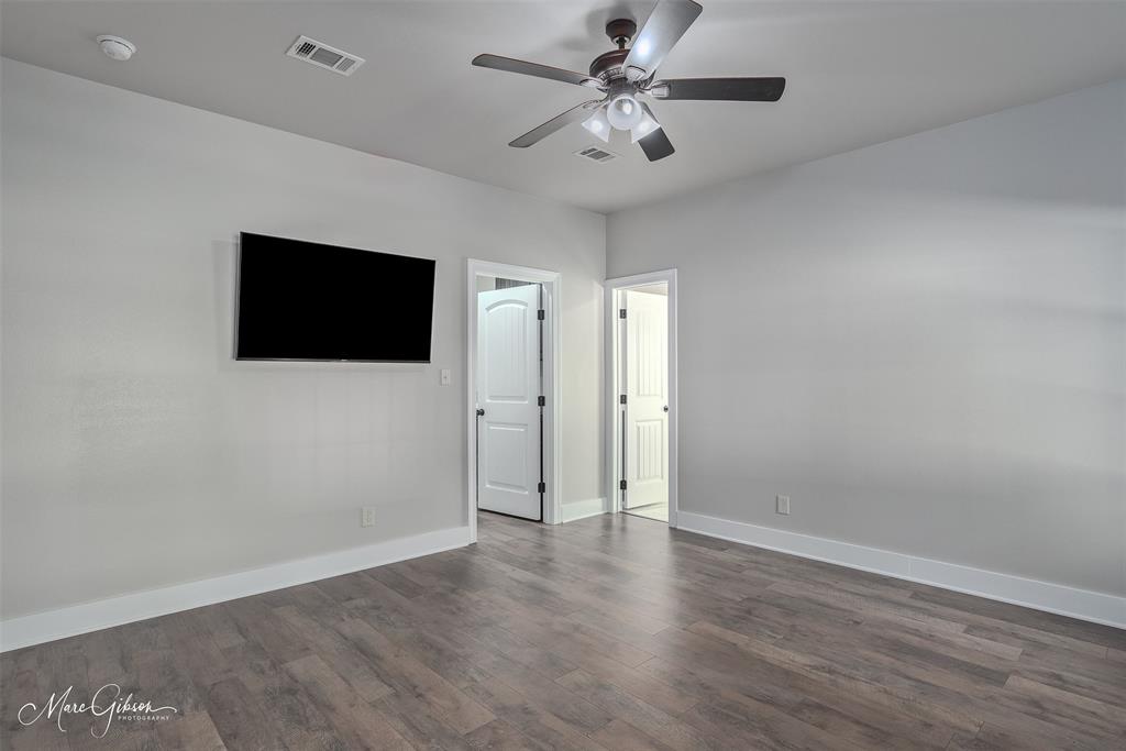 550 Linton Bellevue Road Benton, LA 71006 - Photo 25 of 37 Primary bedroom featuring wood laminate flooring and a ceiling fan