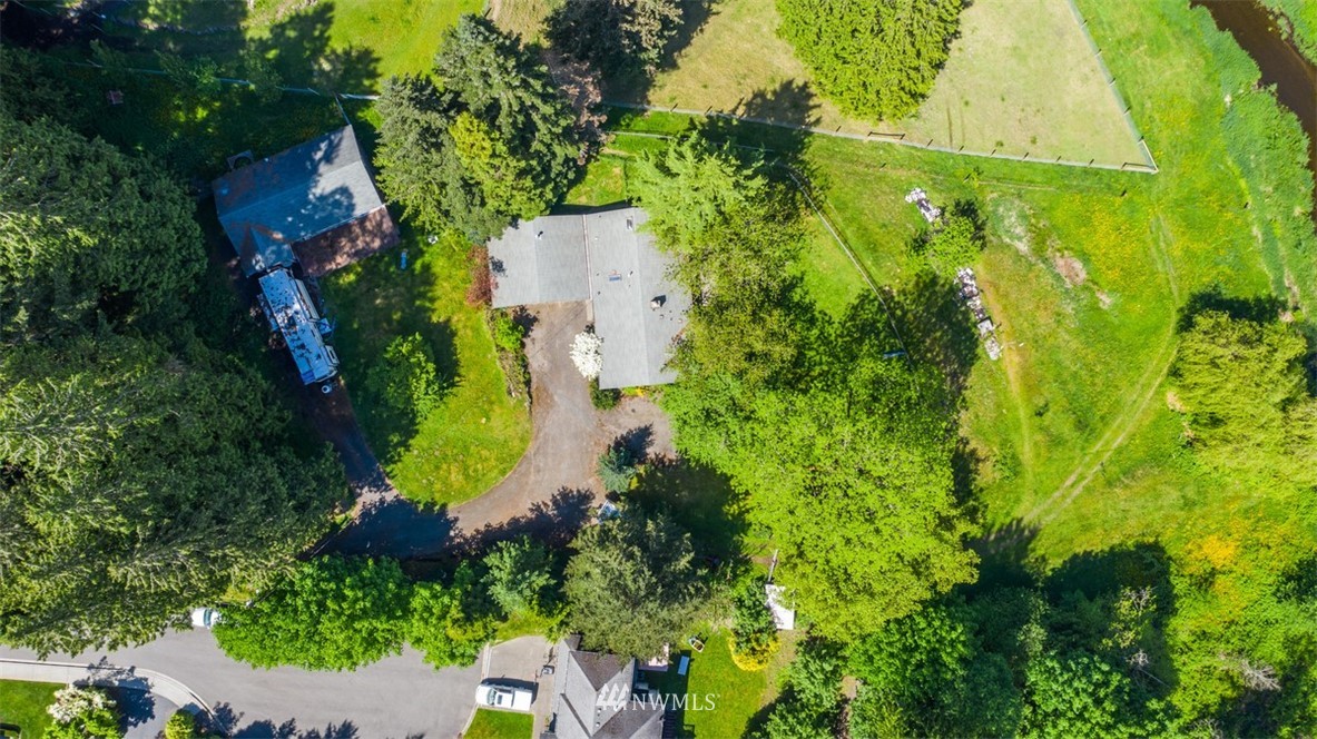 23525 27th Avenue Southeast Bothell, WA 98021 - Photo 2 of 40 an aerial view of a house with a yard