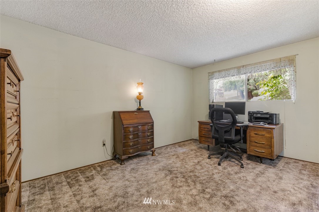 23525 27th Avenue Southeast Bothell, WA 98021 - Photo 14 of 40 a view of a workspace with furniture and a window