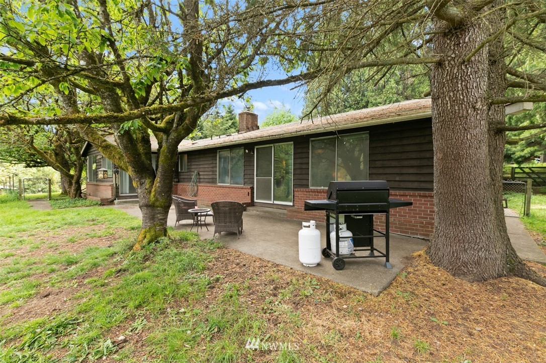23525 27th Avenue Southeast Bothell, WA 98021 - Photo 23 of 40 a view of a house with backyard porch and sitting area