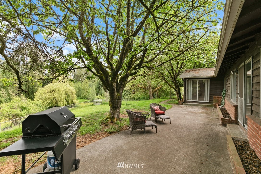 23525 27th Avenue Southeast Bothell, WA 98021 - Photo 24 of 40 a view of a chairs and tables in the patio