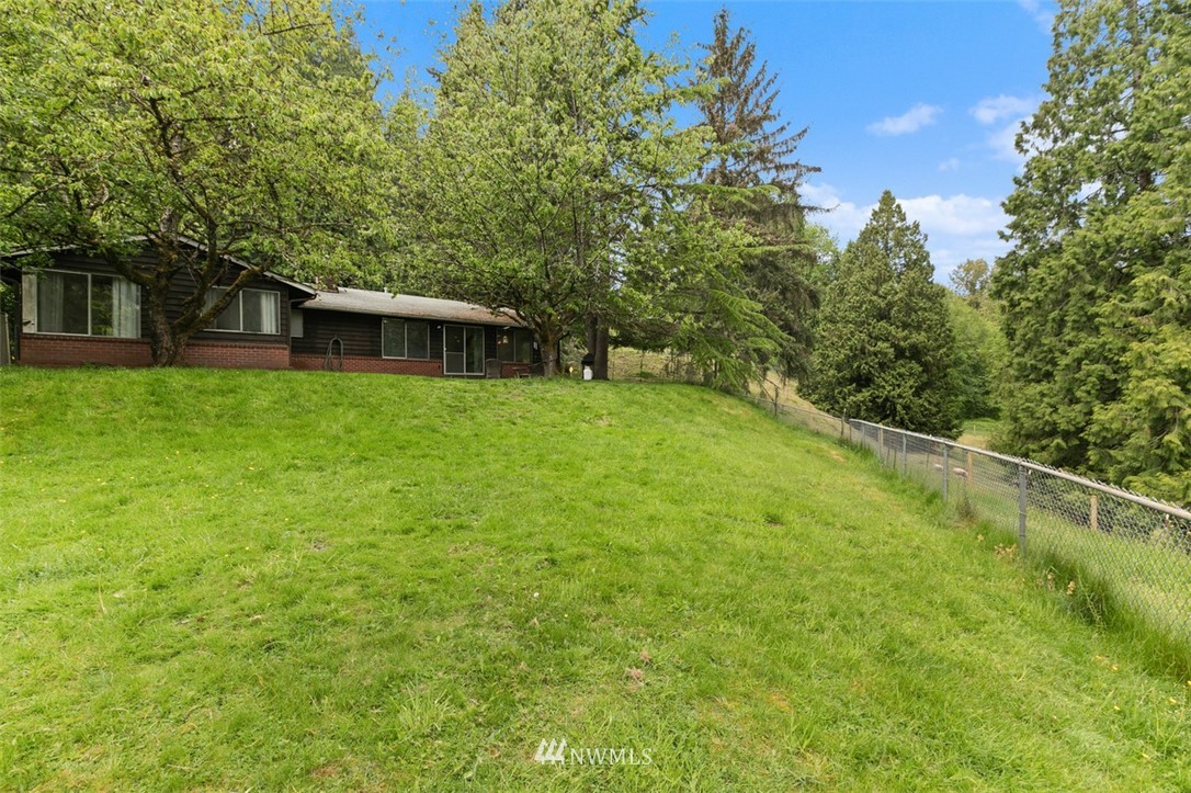 23525 27th Avenue Southeast Bothell, WA 98021 - Photo 26 of 40 a view of a backyard with a garden