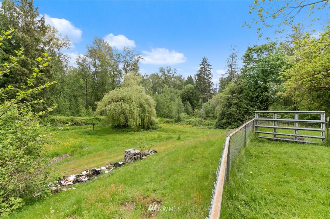23525 27th Avenue Southeast Bothell, WA 98021 - Photo 27 of 40 a view of a golf course with a lake