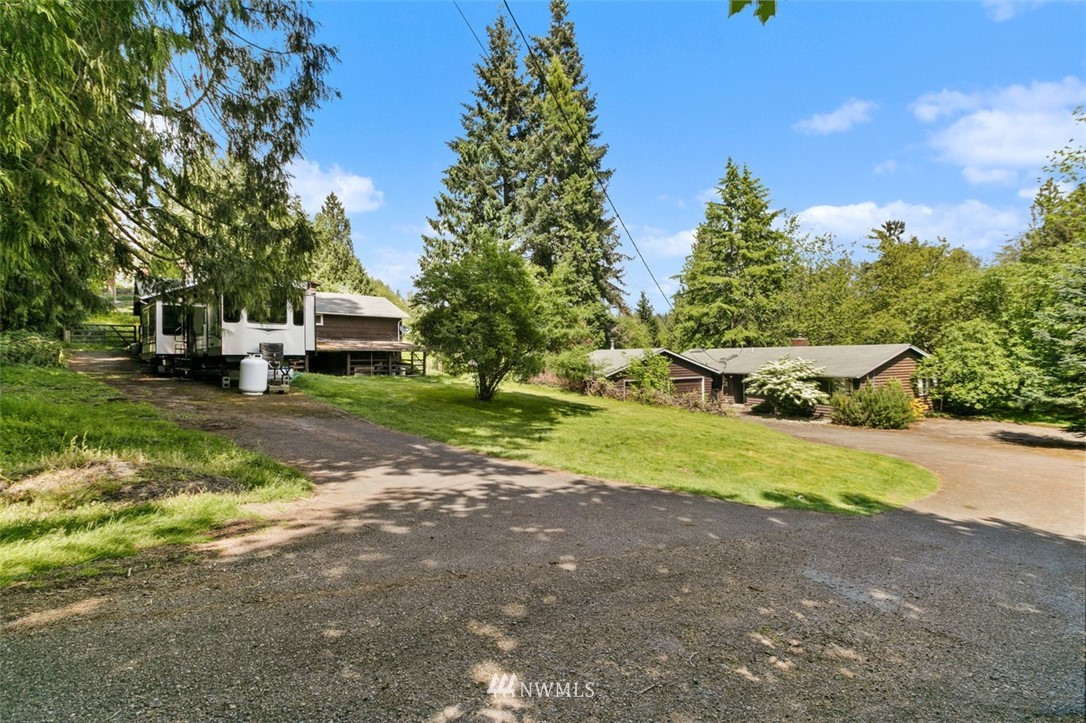 23525 27th Avenue Southeast Bothell, WA 98021 - Photo 36 of 40 a view of a house with a yard and sitting area