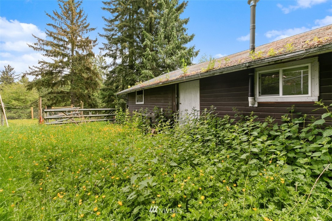 23525 27th Avenue Southeast Bothell, WA 98021 - Photo 39 of 40 a front view of a house with garden