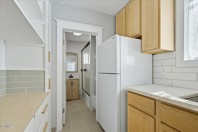a bathroom with a bathtub and a sink