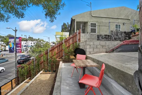 a view of a house with sitting area