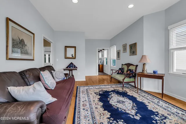 a living room with furniture and a couch