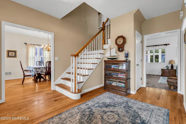a view of livingroom with furniture and wooden floor