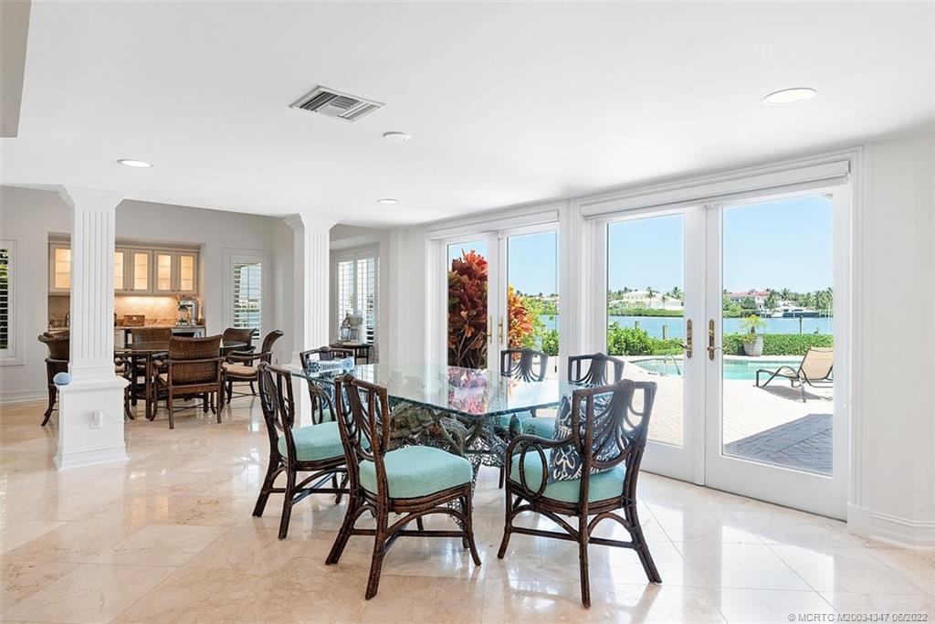 2421 Bahia Way Stuart, FL 34996 - Photo 13 of 83 a view of a dining room with furniture window and outside view