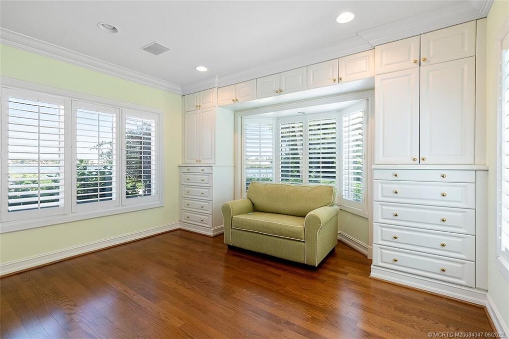 2421 Bahia Way Stuart, FL 34996 - Photo 24 of 83 a living room with furniture and a large window