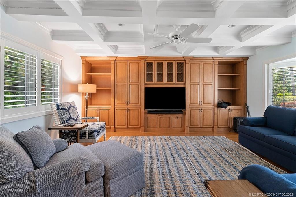 2421 Bahia Way Stuart, FL 34996 - Photo 27 of 83 a bedroom with furniture and a flat screen tv