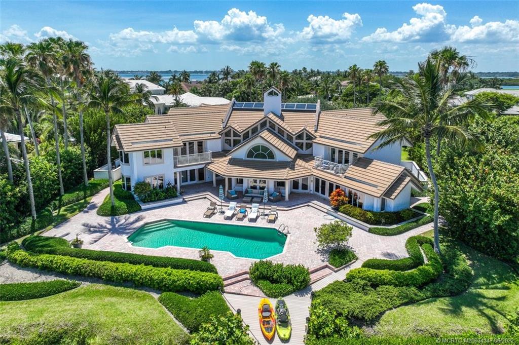 2421 Bahia Way Stuart, FL 34996 - Photo 46 of 83 an aerial view of a house with swimming pool garden and patio