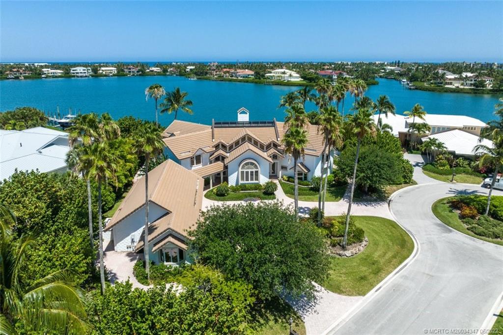 2421 Bahia Way Stuart, FL 34996 - Photo 48 of 83 an aerial view of a house with a lake view