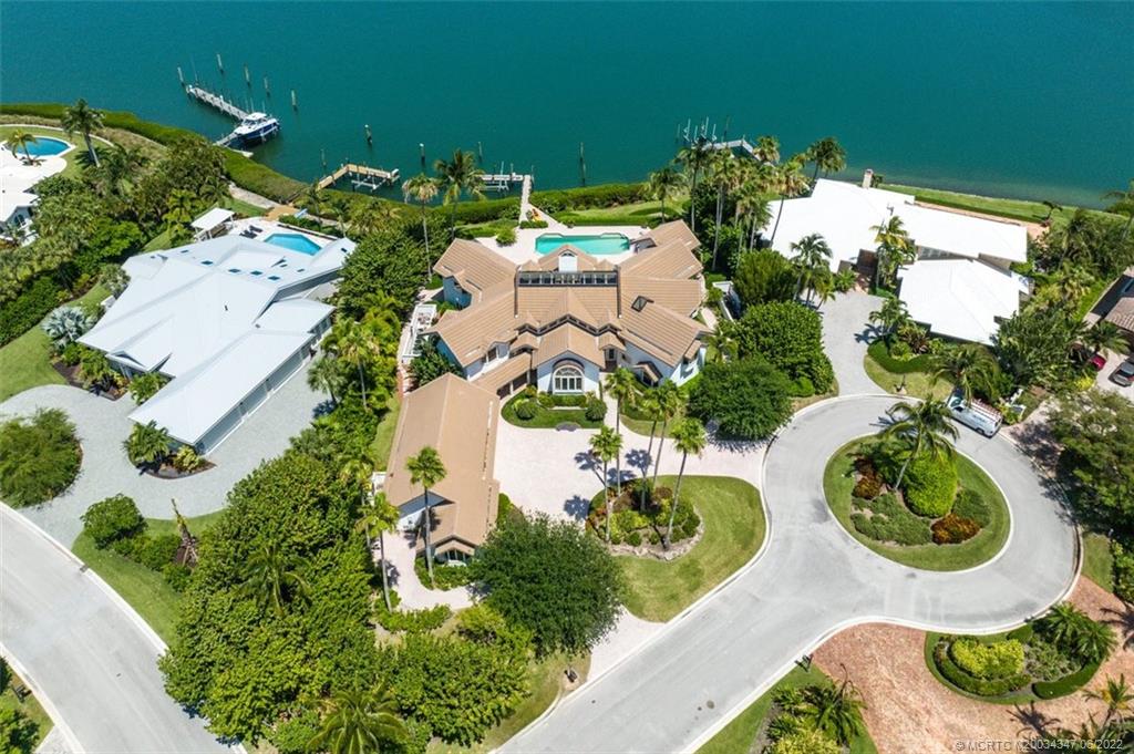 2421 Bahia Way Stuart, FL 34996 - Photo 50 of 83 an aerial view of residential house with outdoor space and swimming pool