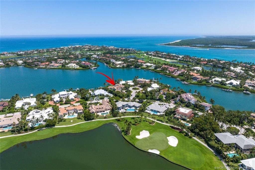 2421 Bahia Way Stuart, FL 34996 - Photo 53 of 83 an aerial view of a city with lots of residential buildings ocean and mountain view in back