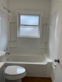 106 Larry Street Aliquippa, PA 15001 - Photo 11 of 14 a bathroom with a toilet and a bathtub