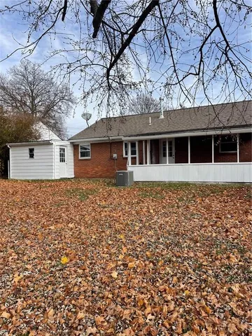 front view of house with a small yard