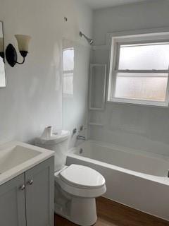 106 Larry Street Aliquippa, PA 15001 - Photo 10 of 14 a bathroom with a toilet a sink and bathtub