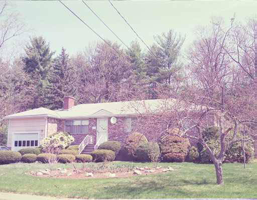 25 Livoli Road Framingham, MA 01701 - Photo 1 of 1 a front view of a house with a yard