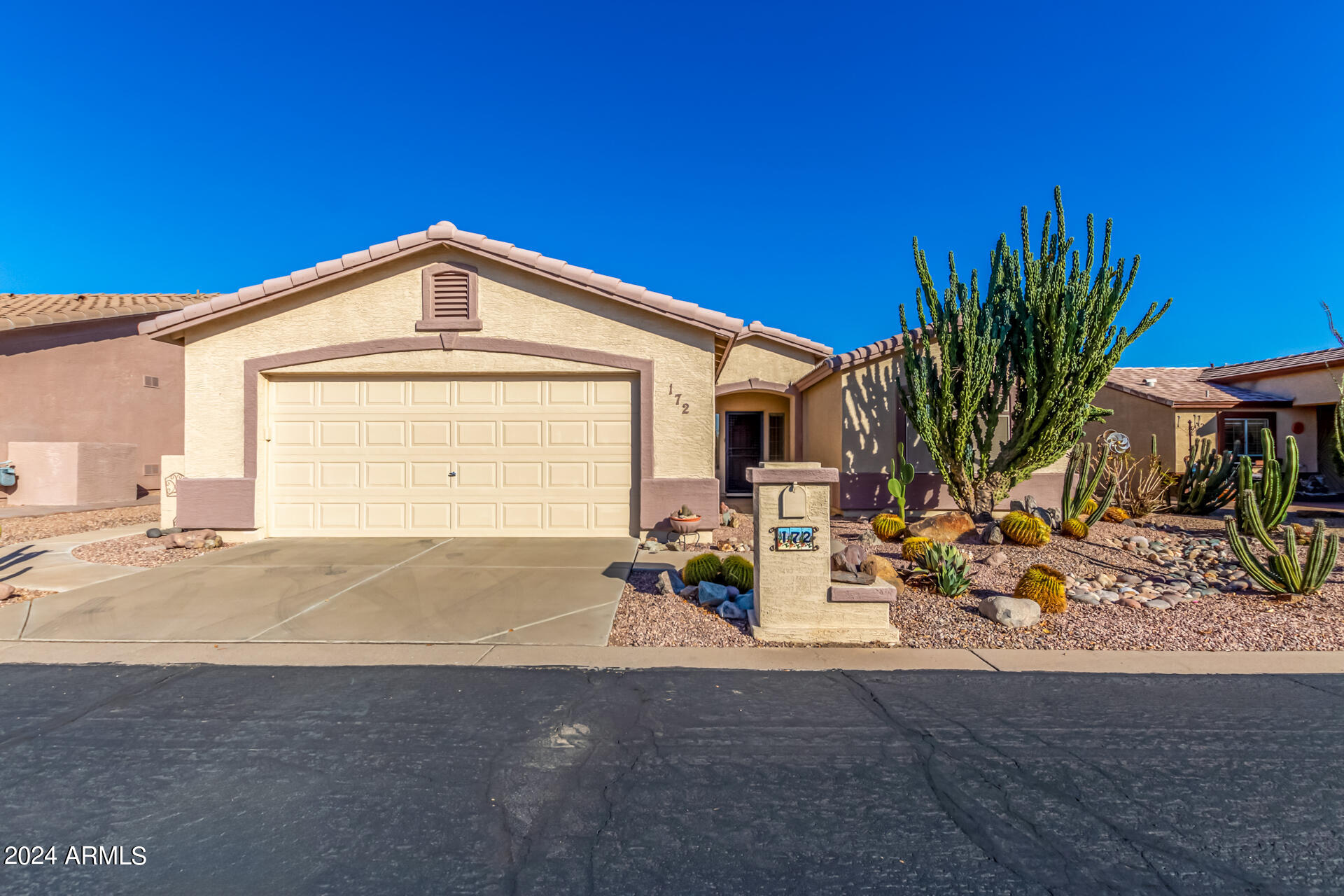2101 South Meridian Road, Unit 172 Apache Junction, AZ 85120 - Photo 1 of 43 a view of backyard of a house
