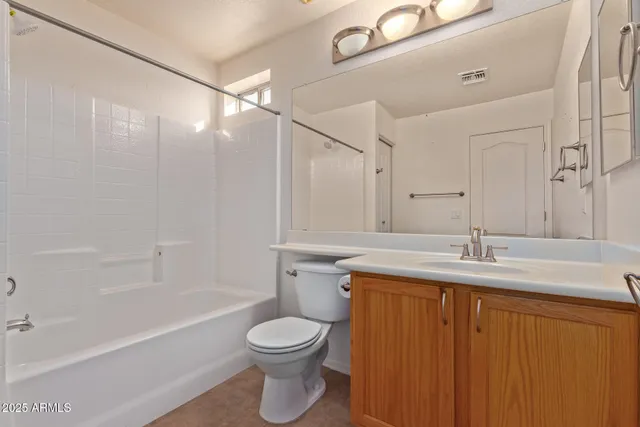 a bathroom with a sink a toilet and a bathtub