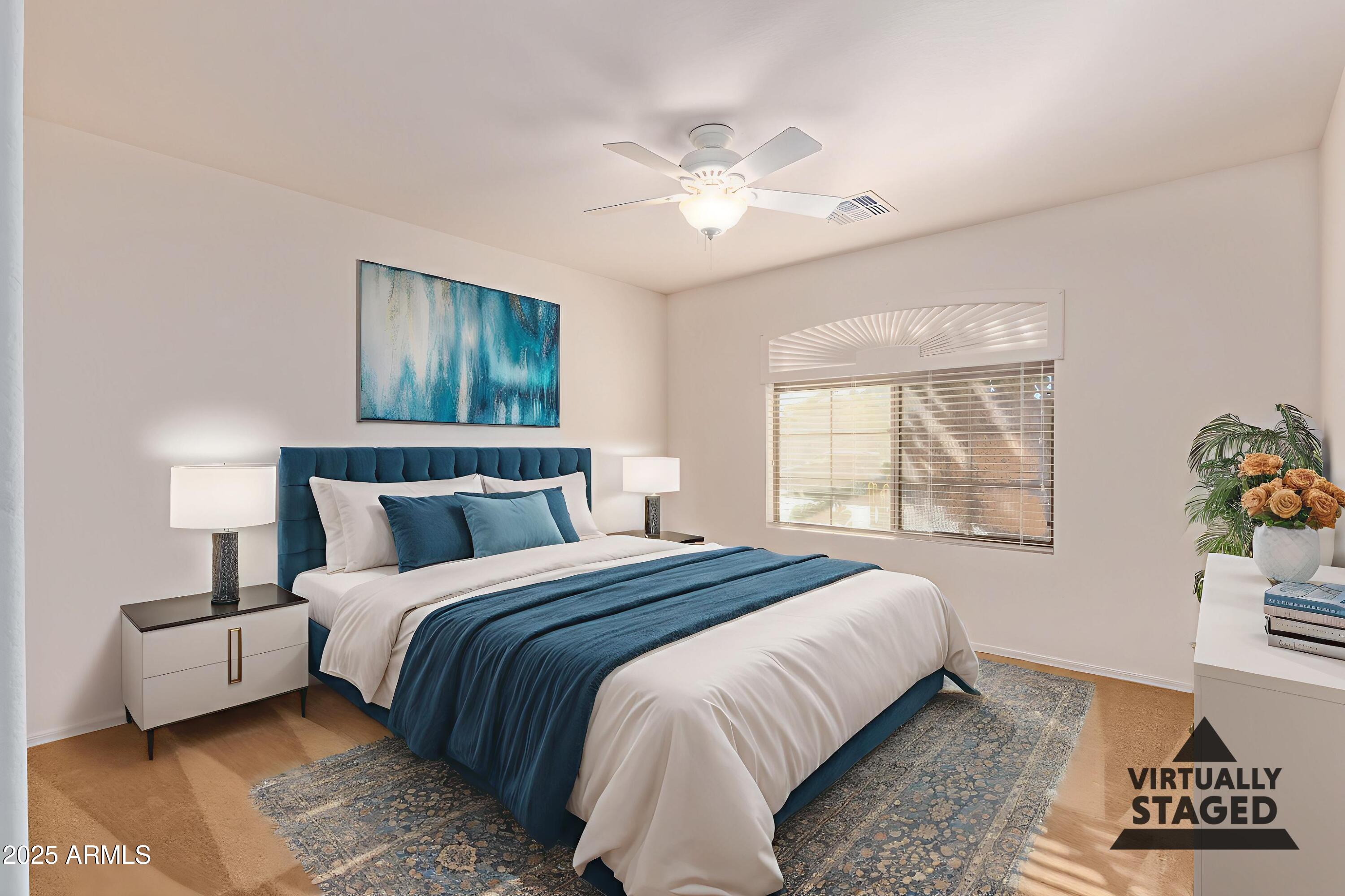 2101 South Meridian Road, Unit 172 Apache Junction, AZ 85120 - Photo 10 of 43 a bedroom with a bed and a window