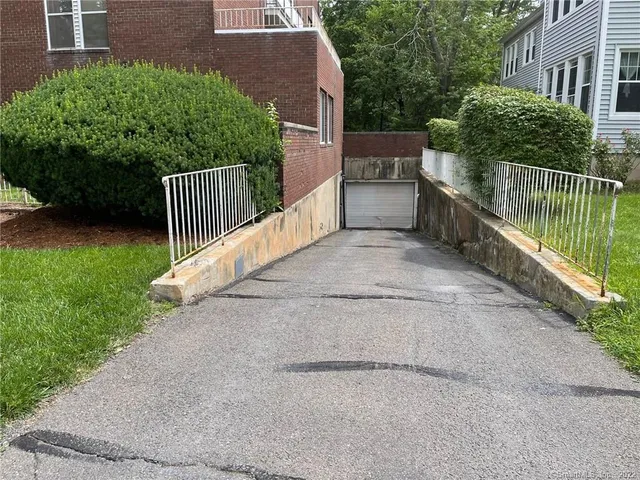 a balcony with trees in front of it