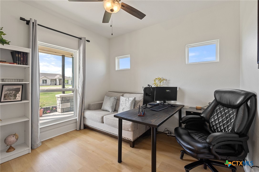 942 Inka Road Salado, TX 76571 - Photo 12 of 46 a work room with furniture and a window