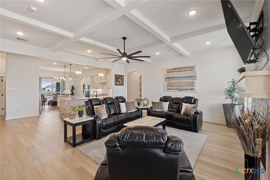 942 Inka Road Salado, TX 76571 - Photo 15 of 46 a living room with furniture and a wooden floor