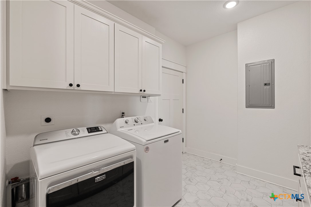 942 Inka Road Salado, TX 76571 - Photo 27 of 46 a utility room with dryer and washer