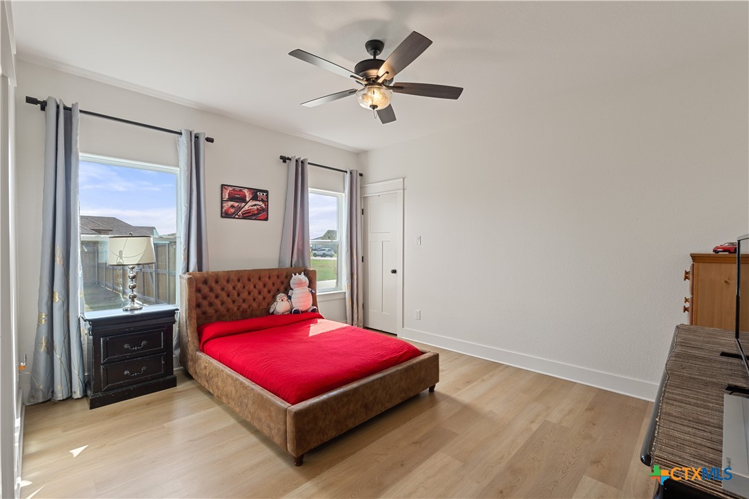 942 Inka Road Salado, TX 76571 - Photo 28 of 46 a bedroom with a bed and a table