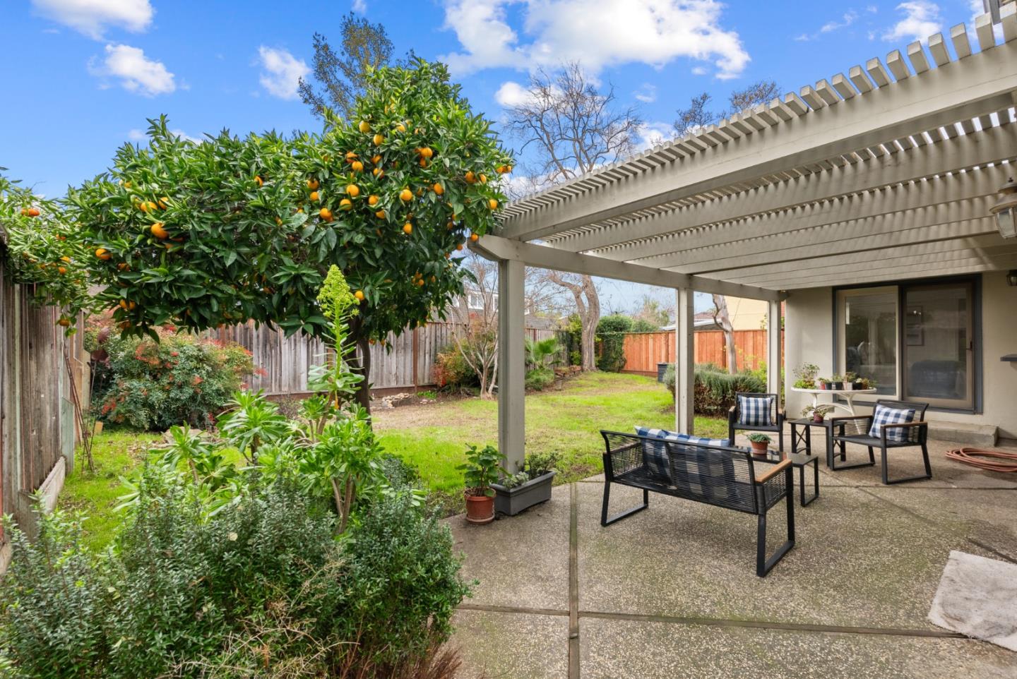 4537 Heppner Lane San Jose, CA 95136 - Photo 33 of 41 a building outdoor space with patio furniture and potted plants