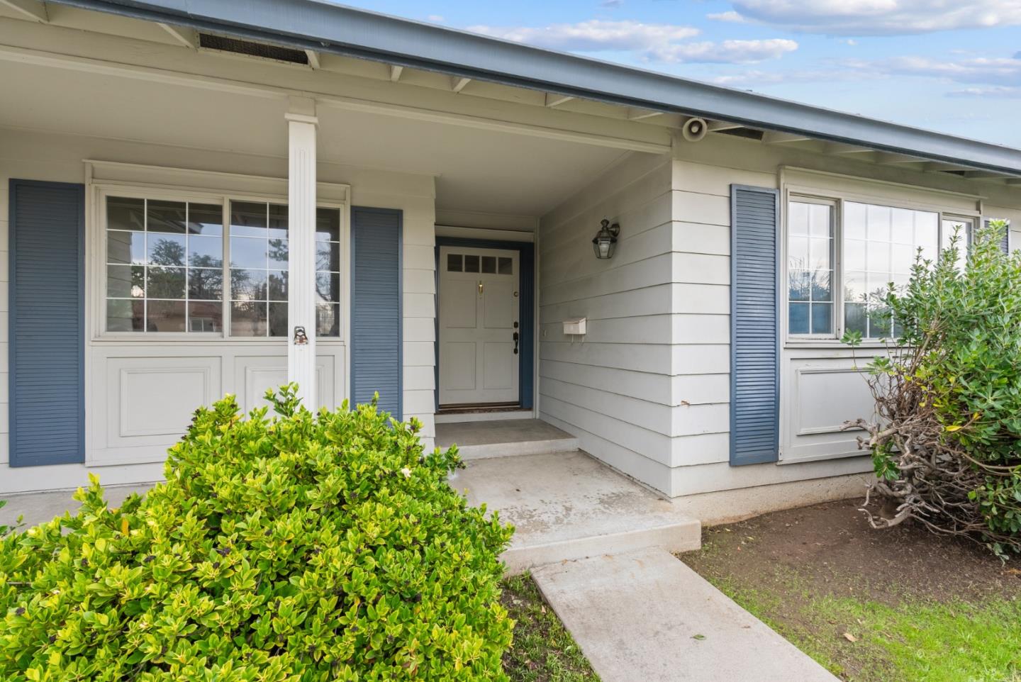 4537 Heppner Lane San Jose, CA 95136 - Photo 4 of 41 front view of a house with a yard