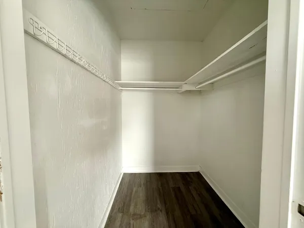 a view of an empty walk in closet