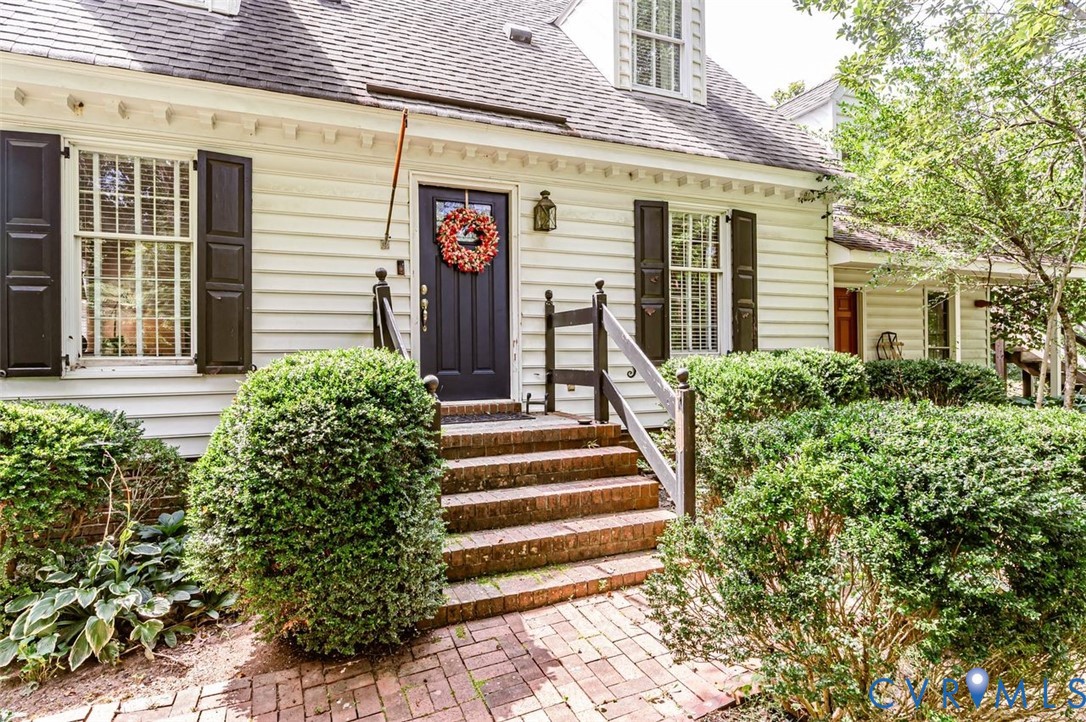 7300 Old Roxbury Road Quinton, VA 23141 - Photo 1 of 89 White siding exterior with dark shutters, gabled r