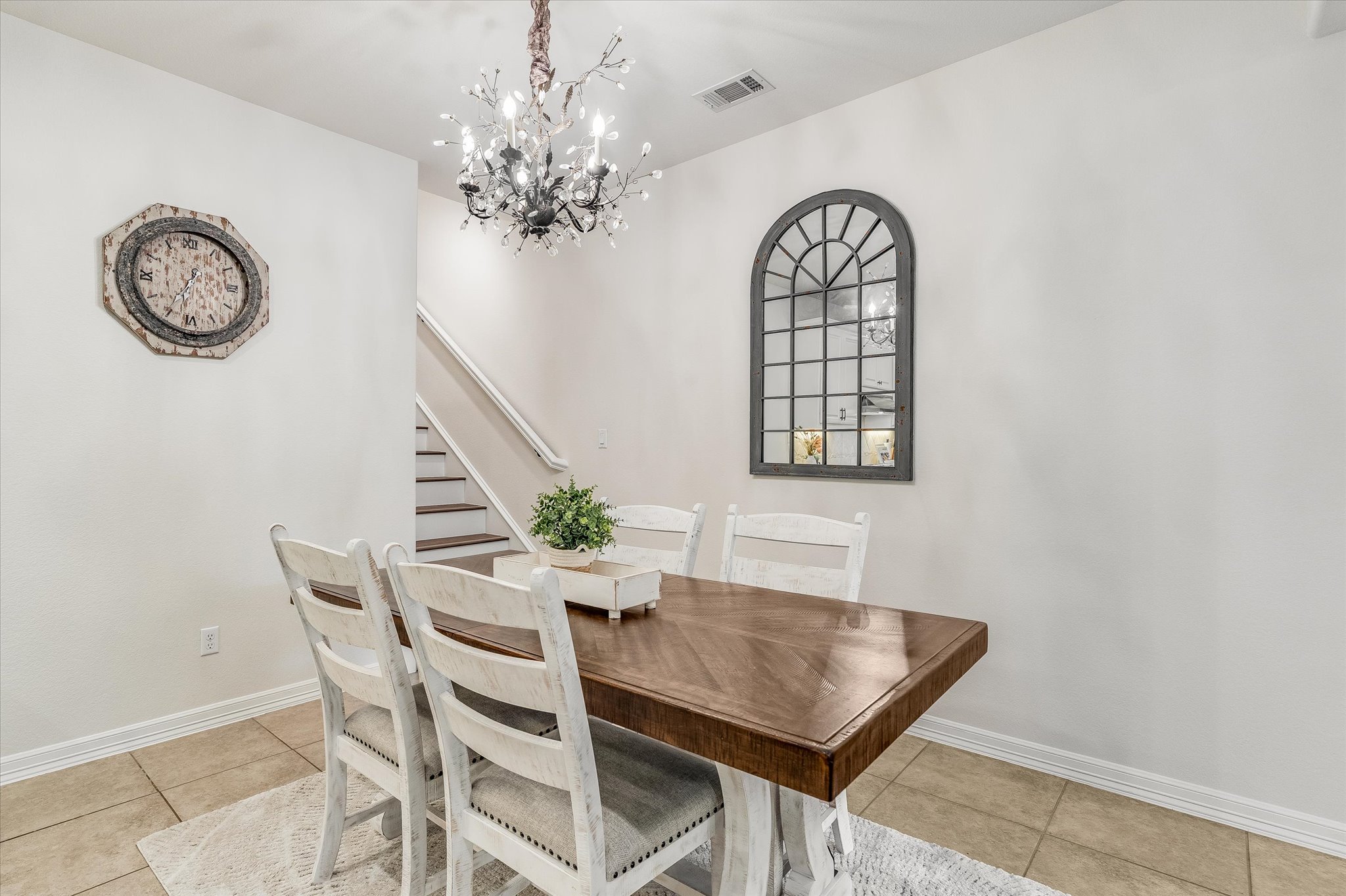 226 Galloway Lane Austin, TX 78737 - Photo 10 of 30 Dining room featuring a chandelier and light tile patterned floors