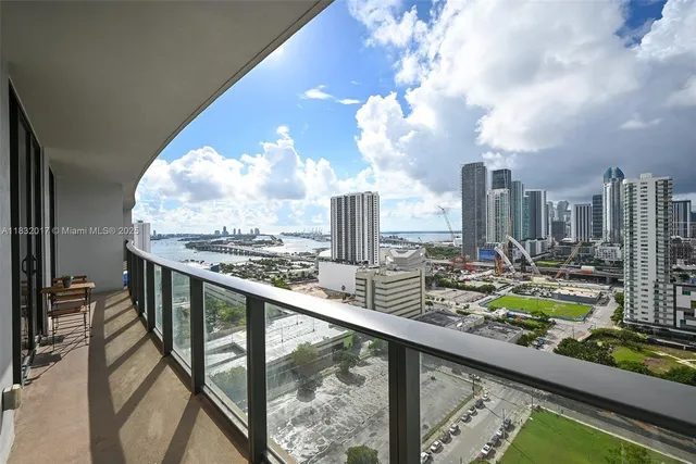 a view of swimming pool from a balcony