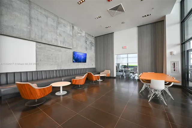 a room with a sink furniture and a mirror
