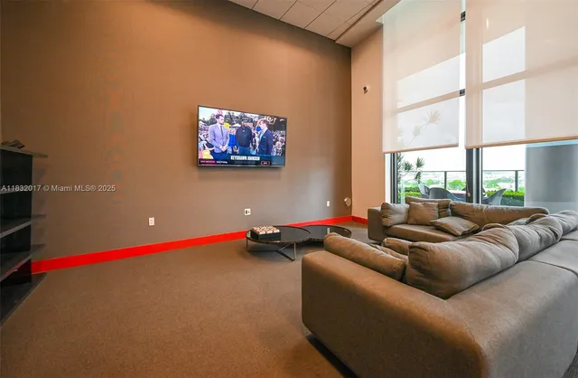 a kitchen with a stove a sink and a refrigerator