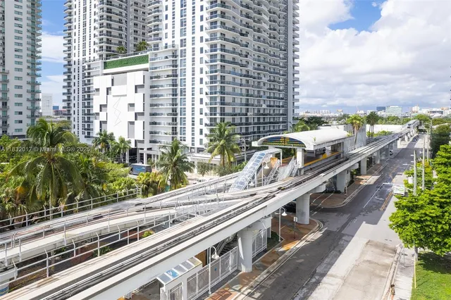 a view of room with window and furniture