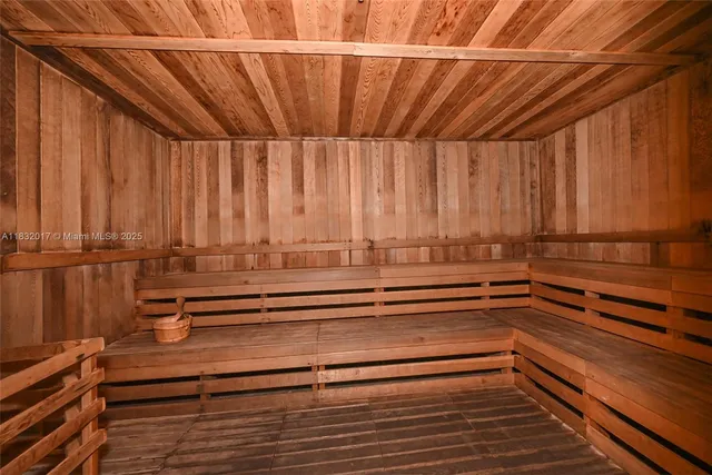 an entryway with wooden floor