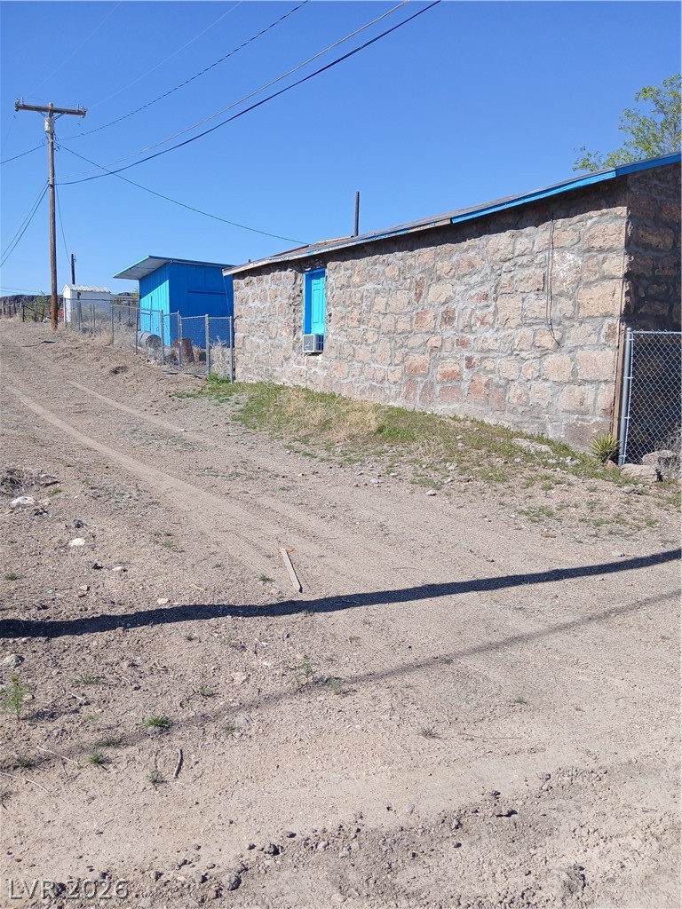 508 North Main Street Goldfield, NV 89013 - Photo 12 of 30 View of side of property with stone siding
