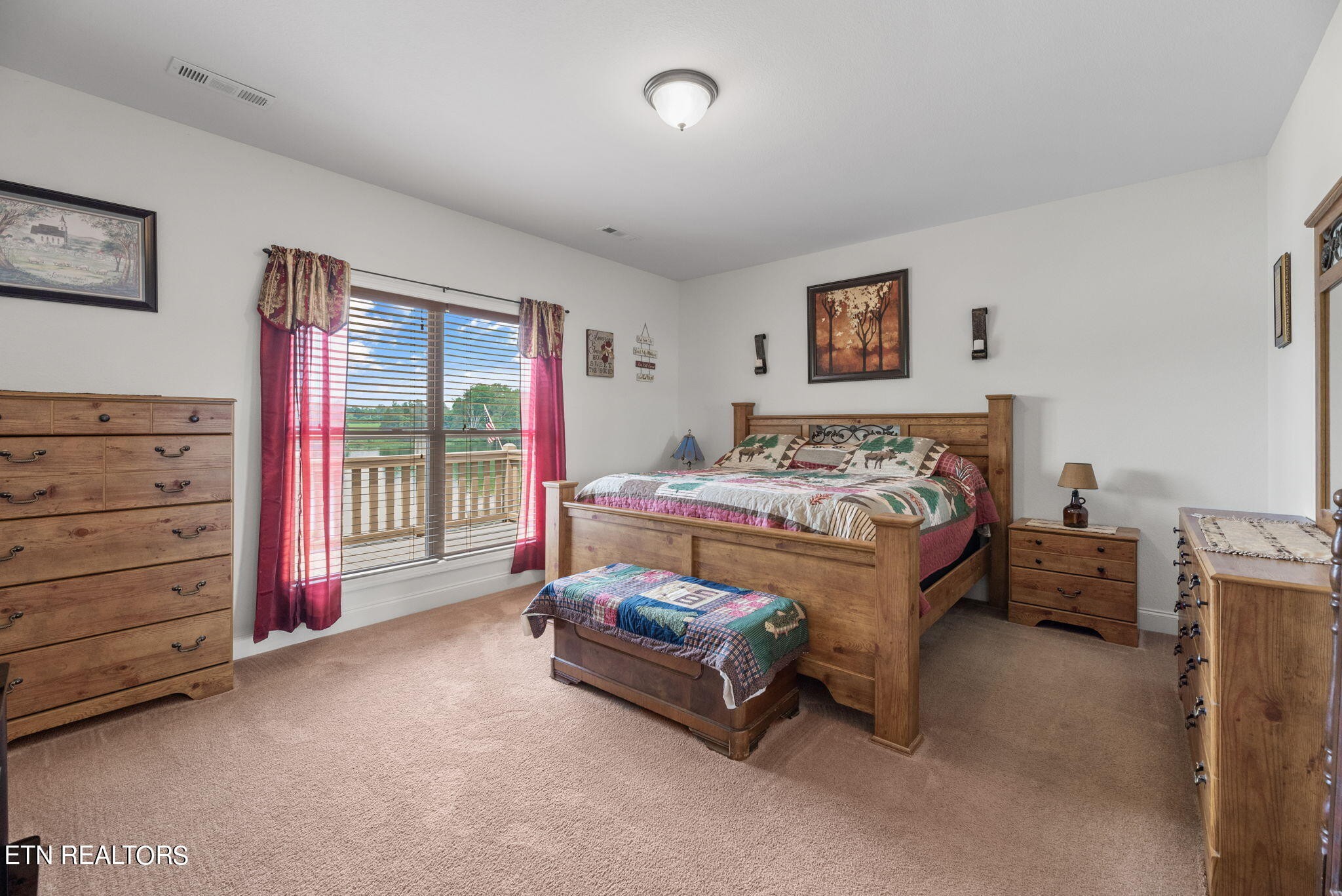 296 Shields Crossing Drive Bean Station, TN 37708 - Photo 13 of 52 a bedroom with a bed and a dresser