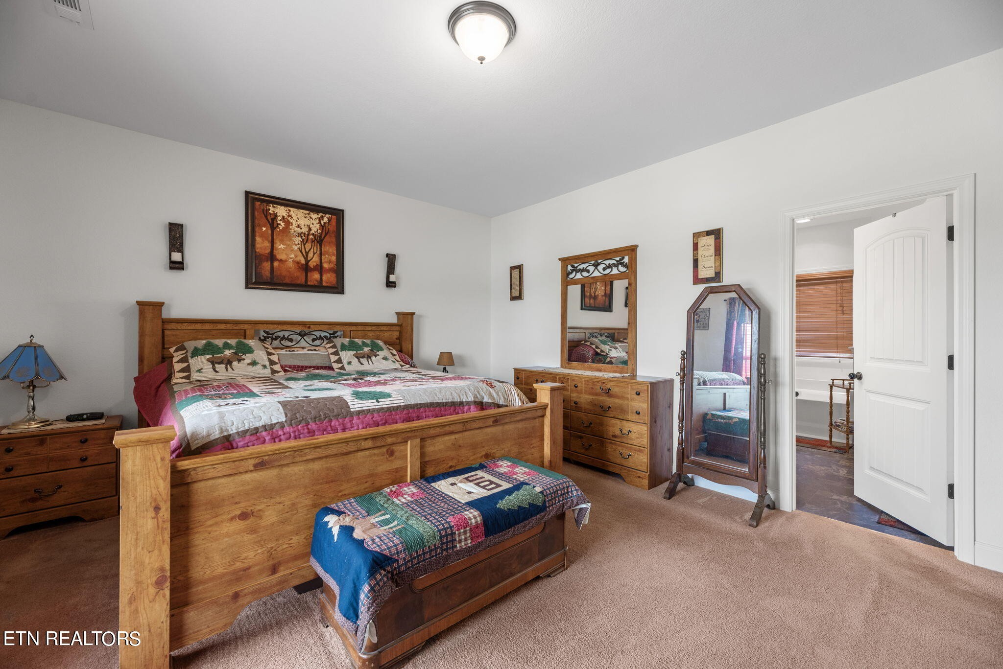 296 Shields Crossing Drive Bean Station, TN 37708 - Photo 14 of 52 a bedroom with a bed and furniture