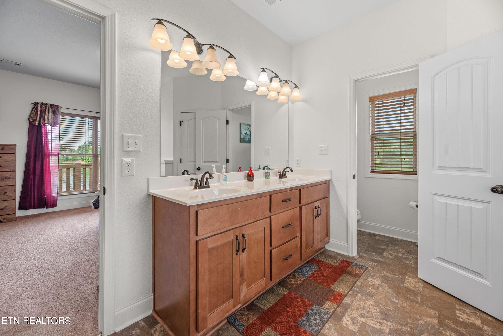 296 Shields Crossing Drive Bean Station, TN 37708 - Photo 16 of 52 a spacious bathroom with a double vanity sink mirror and
