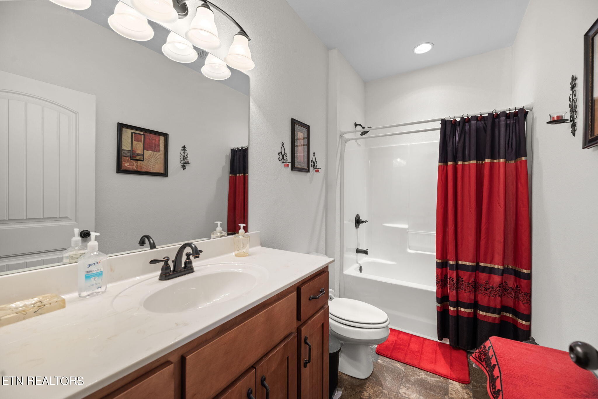 296 Shields Crossing Drive Bean Station, TN 37708 - Photo 21 of 52 a bathroom with a sink a toilet and shower