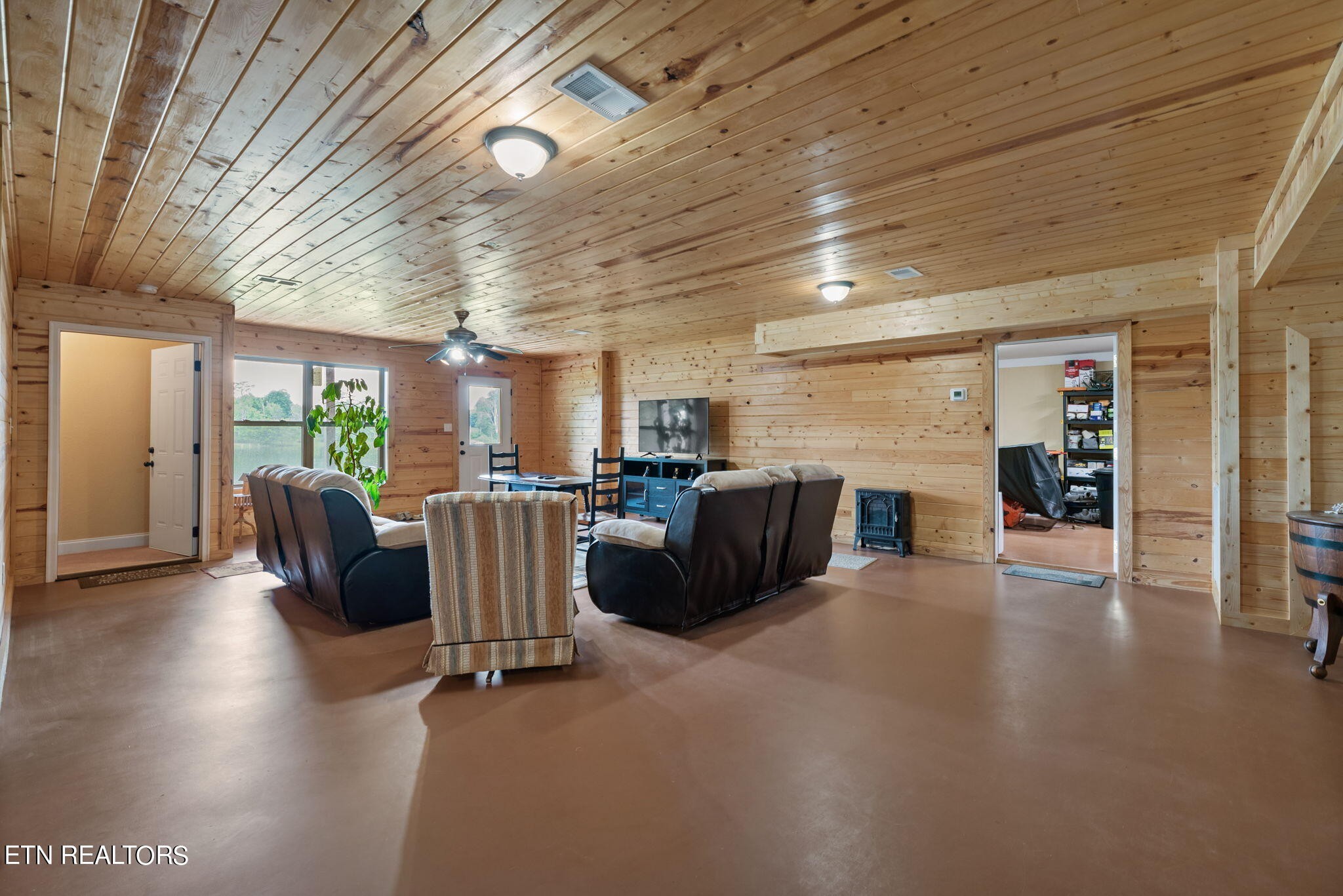 296 Shields Crossing Drive Bean Station, TN 37708 - Photo 26 of 52 a living room with furniture and a wooden floor