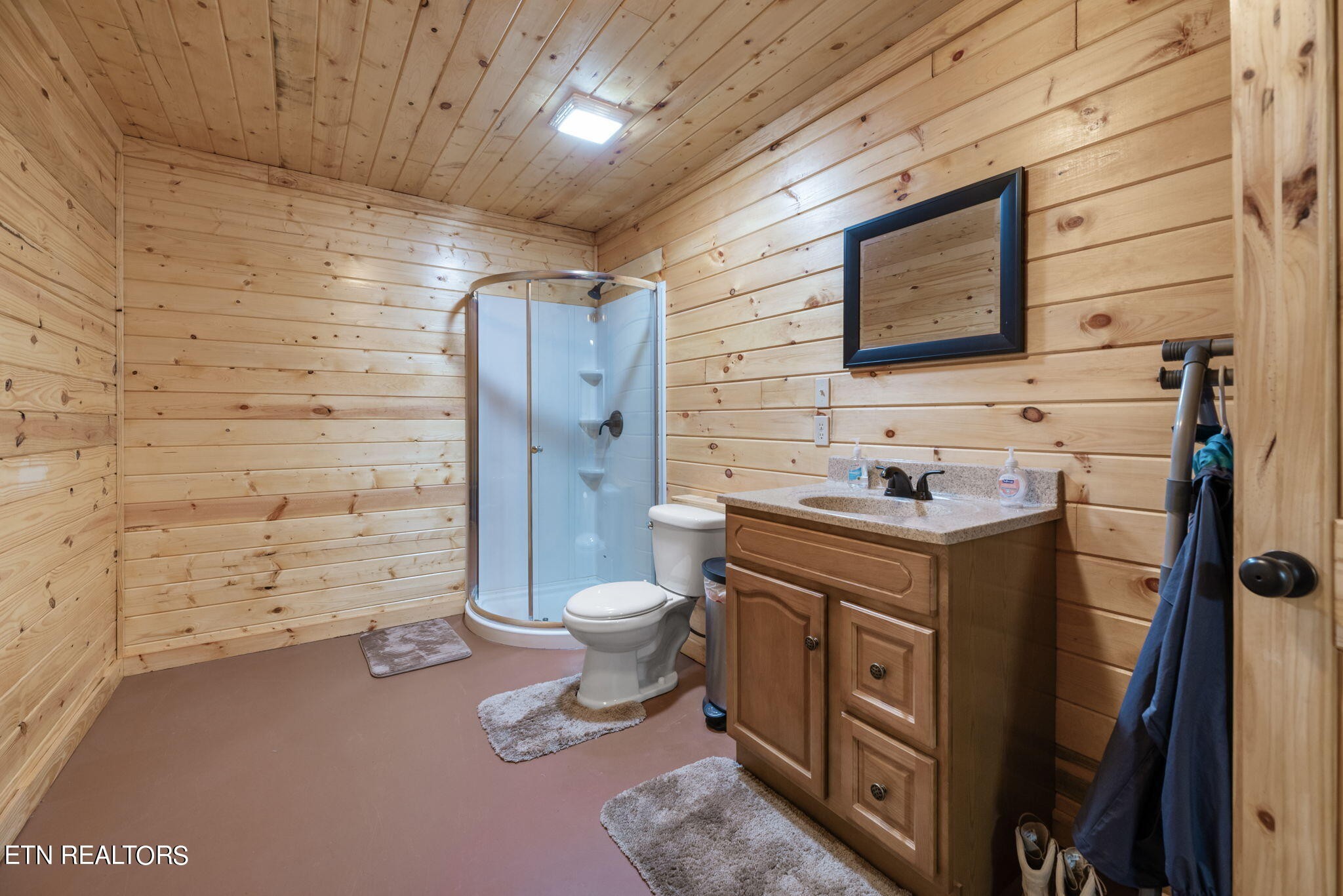 296 Shields Crossing Drive Bean Station, TN 37708 - Photo 30 of 52 a bathroom with a granite countertop toilet sink and mirror